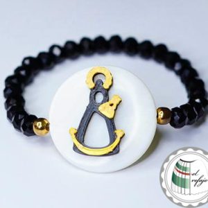 Pulsera negra y dorada Virgen de los Llanos_01